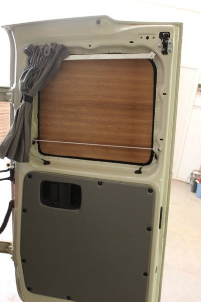 Metris dark wood insulation panel on rear door