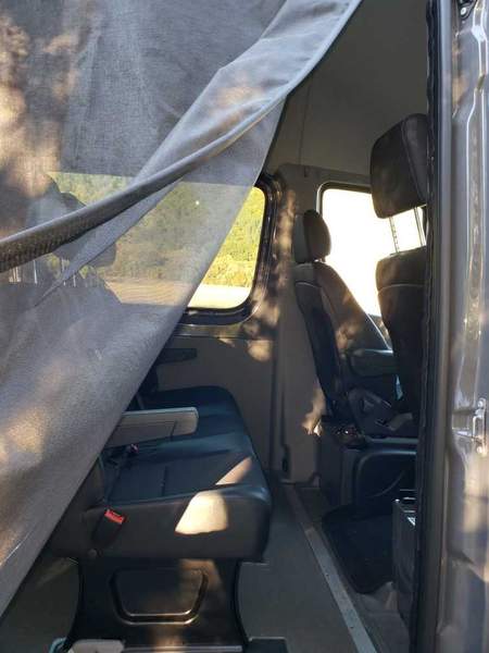 3.0 magnet screen pulling open for entry - shown on a Sprinter