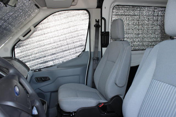 Promaster City cab window insulation sets - shown on a Transit van