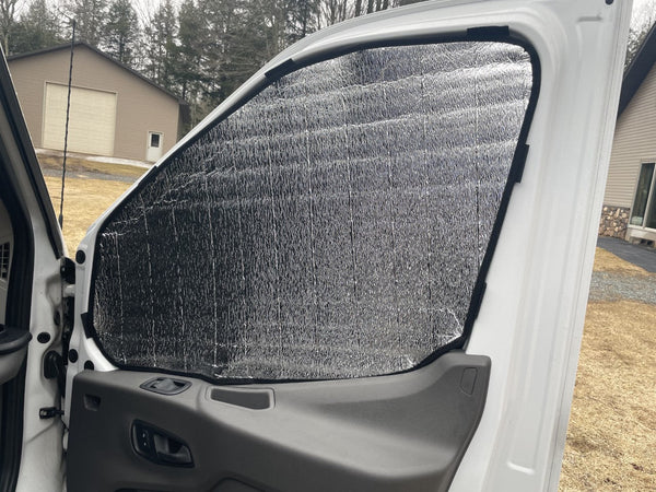Window insulation panel on a Transit w/ magnets