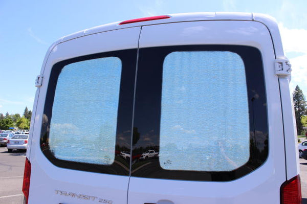 Promaster mix and match rear door window insulation panels outside view on a Transit van